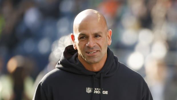 New York Jets head coach Robert Saleh smiles on sideline